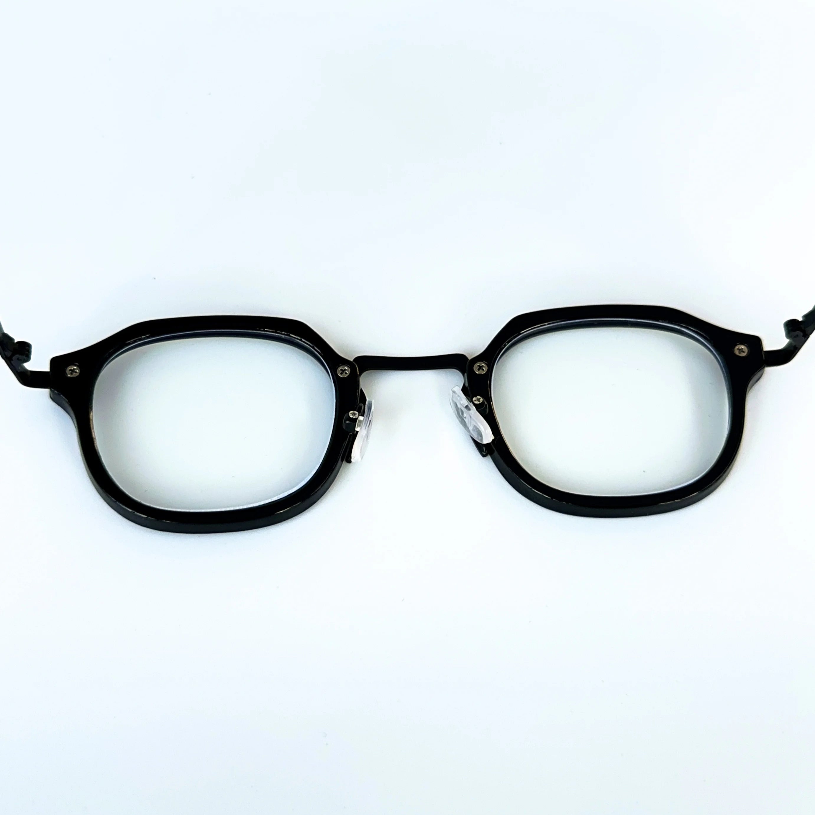 Black eyeglasses on a white background