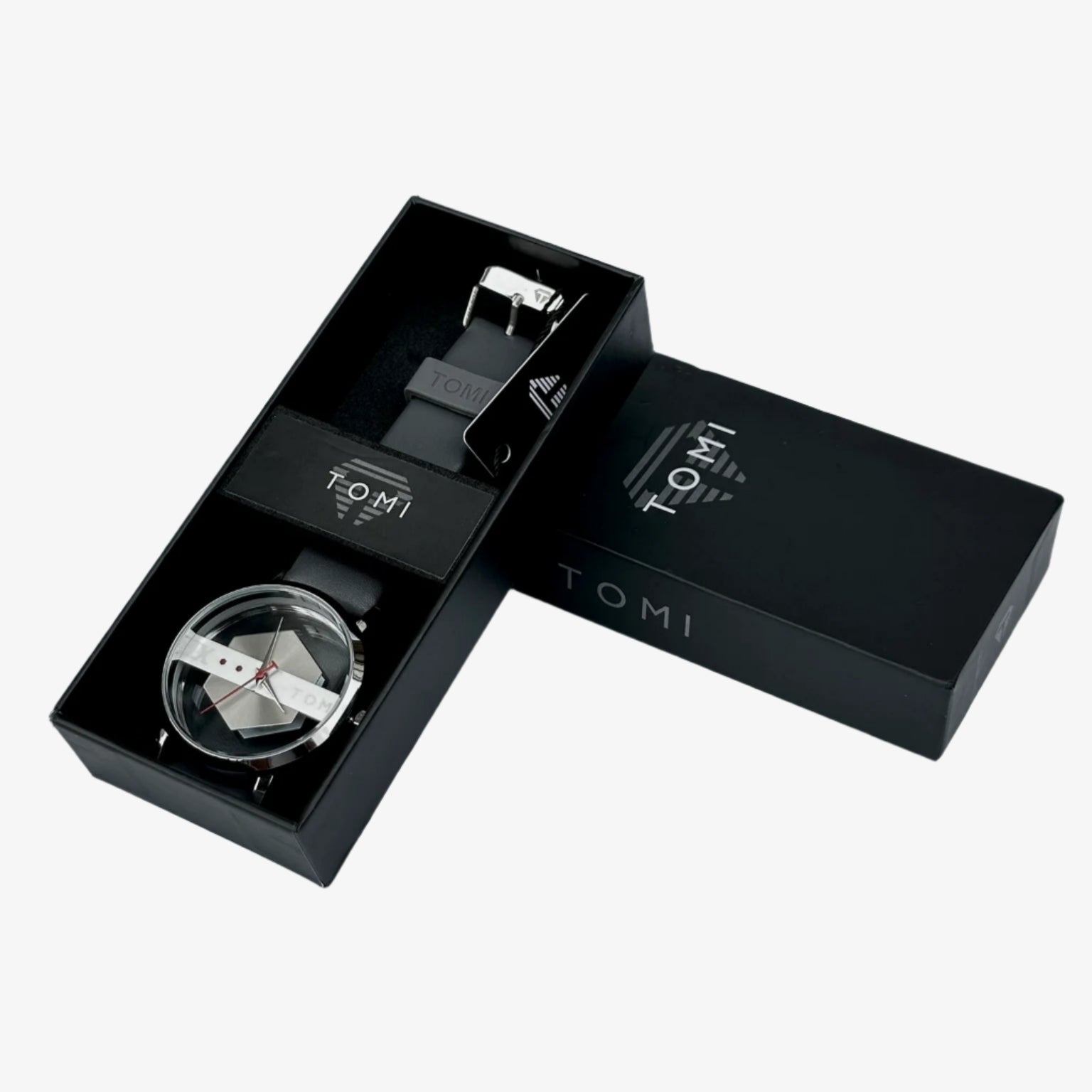 Black packaging box with 'TONI' branding on a gray background