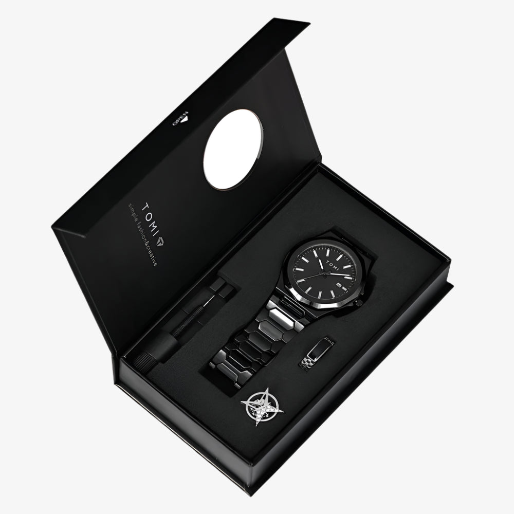 Black watch and pen set in a branded box on a white background