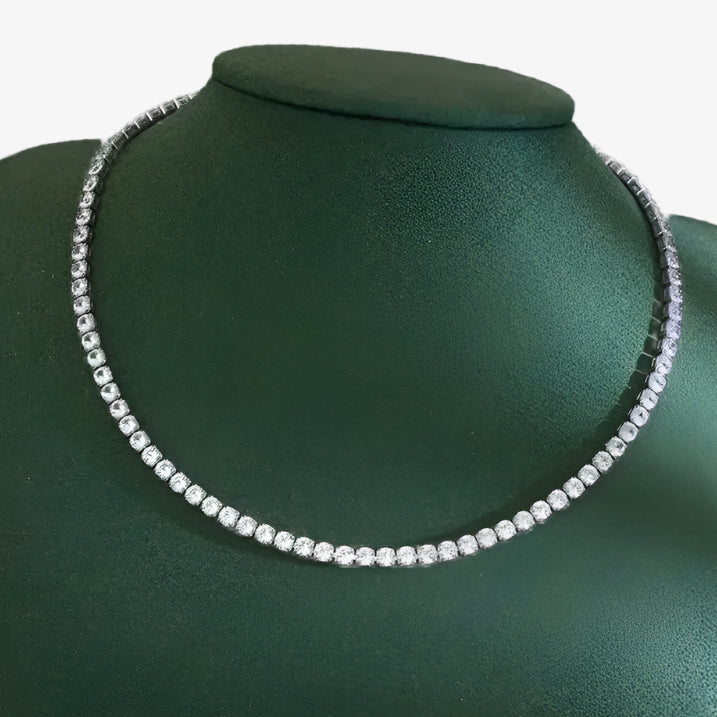 Diamond necklace on a green velvet stand