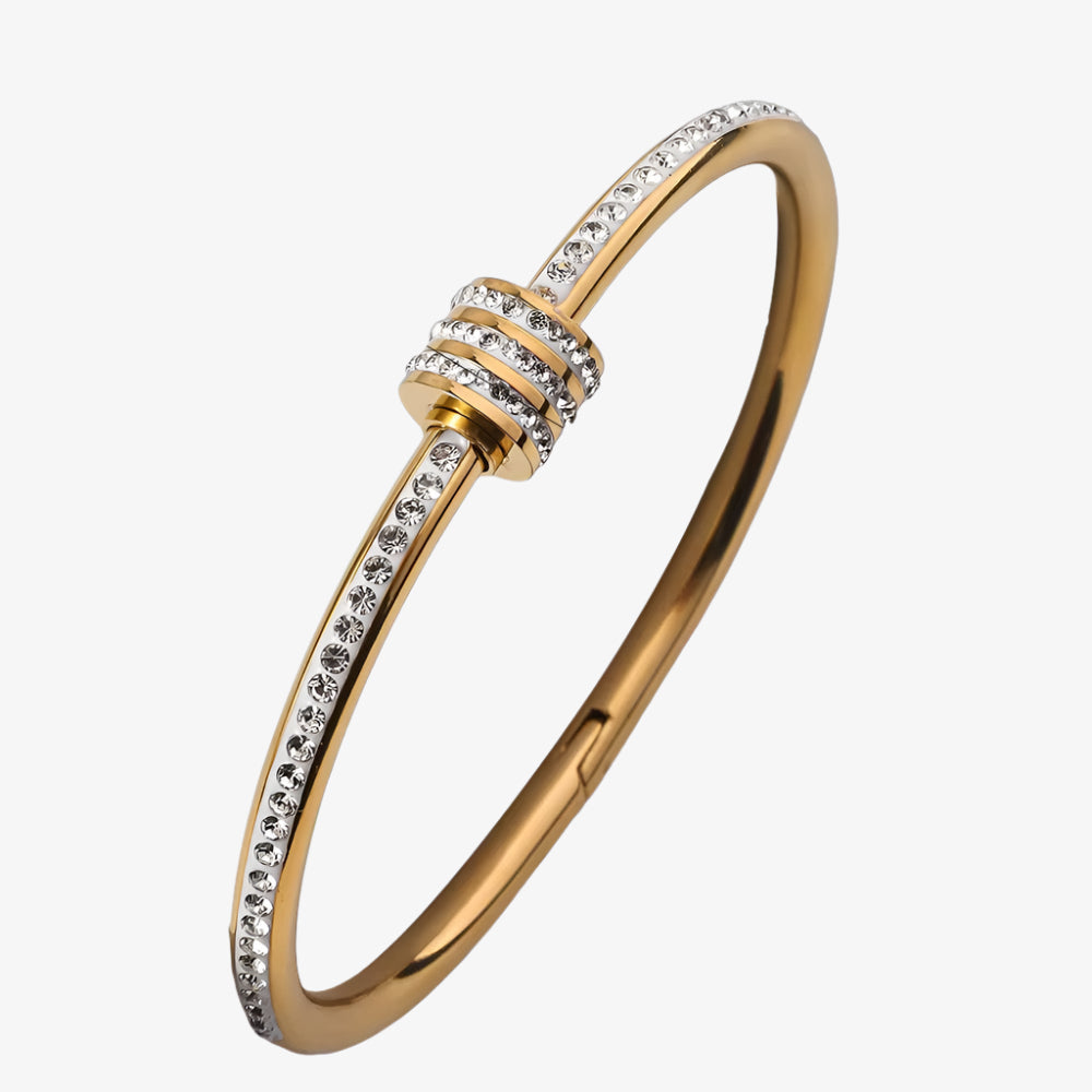 Gold bracelet with measurement details on a white background
