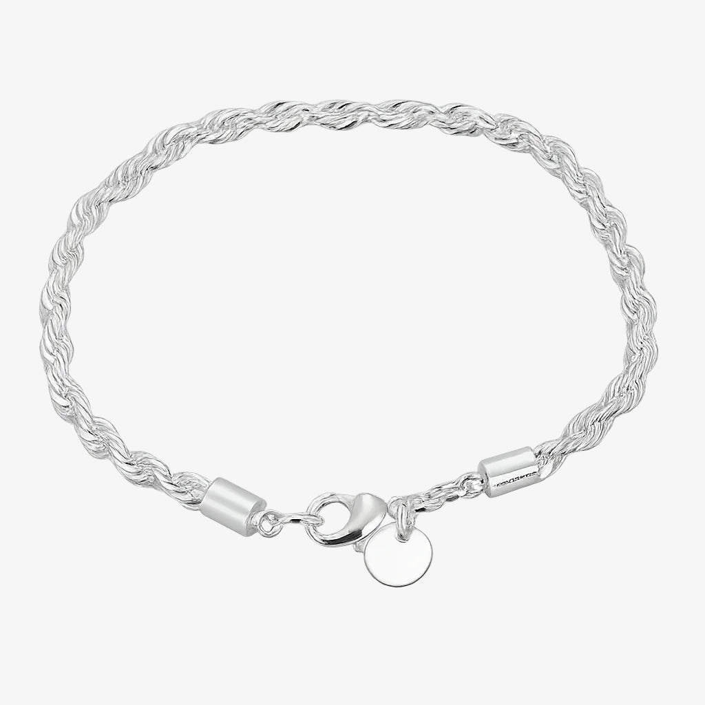 Silver braided bracelet with a clasp on a white background