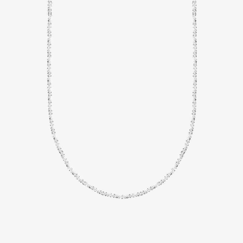 Silver chain necklace on a white background
